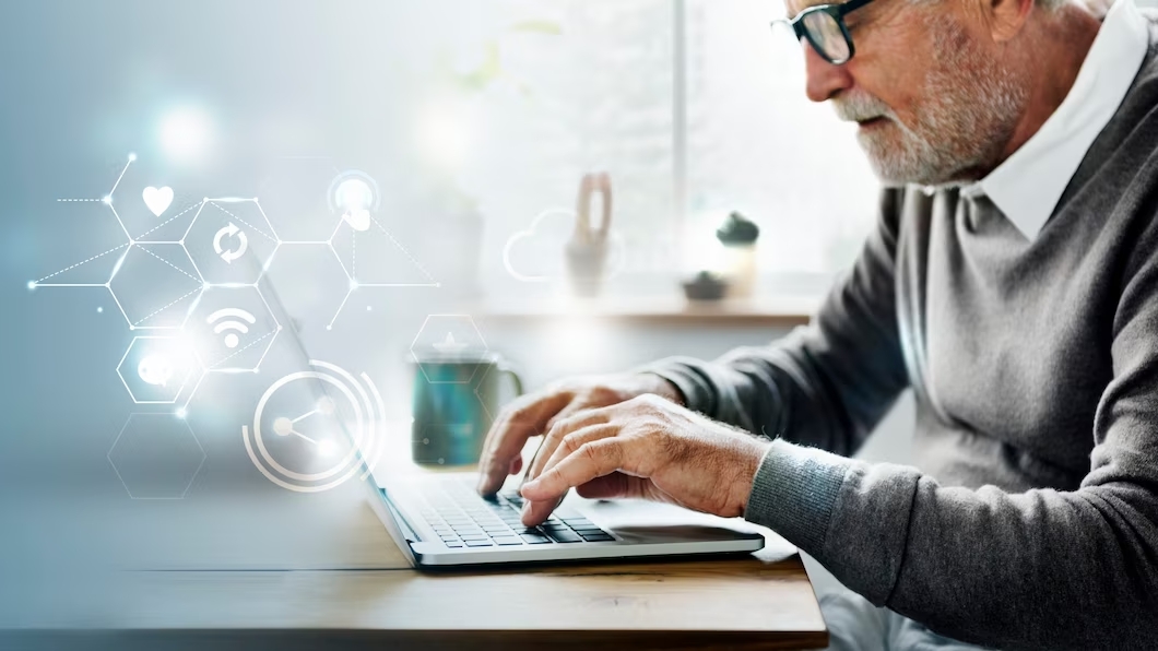 old-man-using-laptop_53876-96887